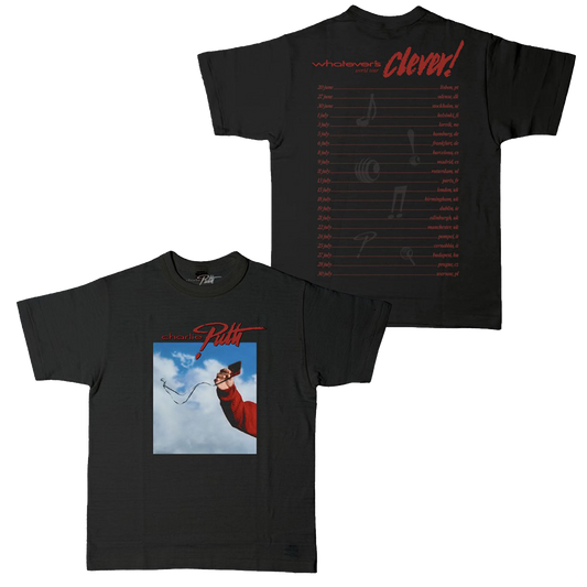 Black t-shirt with Charlie Puth logo in red and graphic of Charlie's arm holding a cassette tape in the clouds on the front and Whatever's Clever! 2026 tour dates in red text with music note symbols in gray on the back